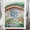 Aquarelle originale sur chevalet d'une façade de maison de Hobbit de la Comté avec sa porte ronde ©Ysae illustrations