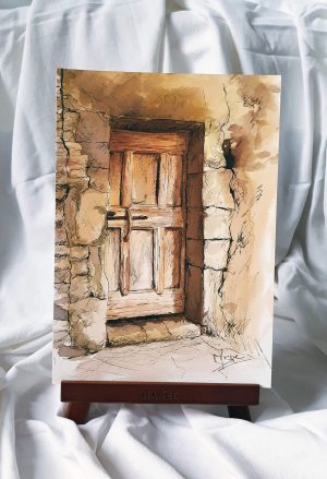 Dessin original 'Le Seuil', dessin à l'encre représentant l'entrée d'un vieux bâtiment avec une porte en bois, dans des tons ocres et sépia et présenté sur chevalet ©Ysae illustrations