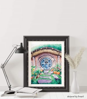 Décoration d'intérieur avec un cadre dans lequel se trouve une aquarelle représentant une maison de hobbit