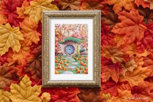 Impression laser d'une aquarelle originale présentée dans un cadre et représentant la devanture d'une maison de Hobbit dans un paysage automnal avec des citrouilles partout ©Ysae illustrations