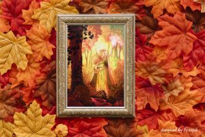 Dessin numérique sous cadre représentant une jeune sorcière noire aux yeux rouges en uniforme d'université, assise dans les feuilles d'automne en train de regarder un livre de gravures anciennes ©Ysae illustrations