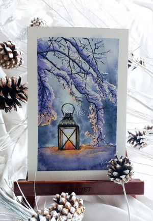 Aquarelle originale sur chevalet représentant une lanterne éclairée et posée dans la neige @Ysae illustrations