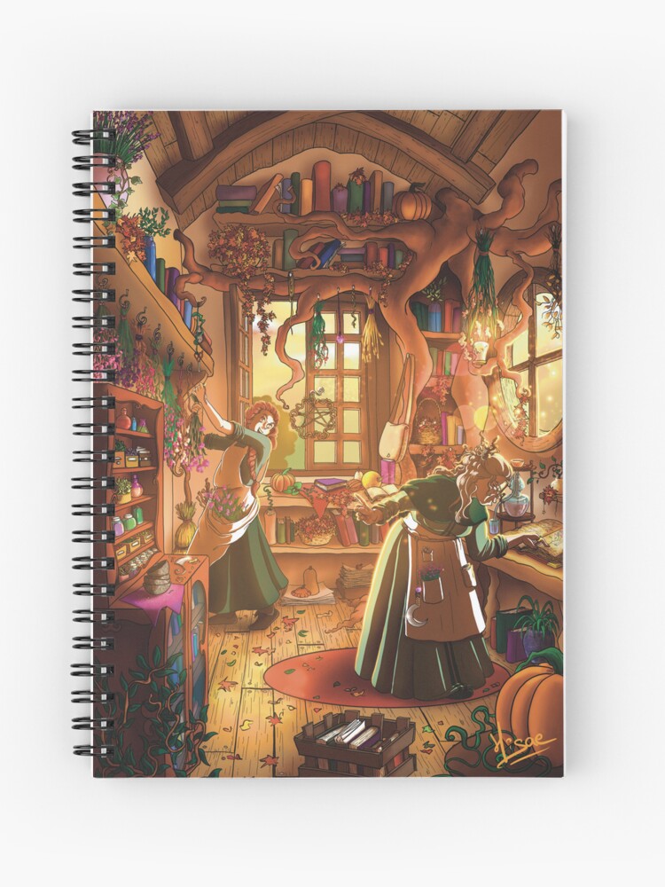 Carnet à spirales dont la couverture est un dessin numérique représentant deux herboristes dans leur atelier plein de livres et de plantes et baigné dans la lumière d'automne ©Ysae illustrations