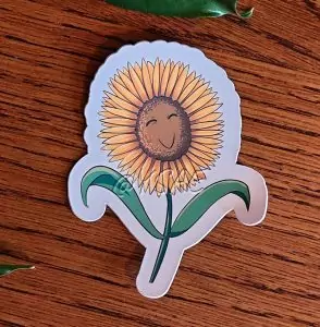 Sticker représentant une fleur de tournesol heureuse @Ysae illustrations