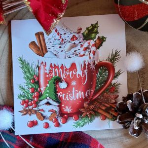 Affichette 20x20 cm représentant un mug plein de chocolat chaud, crène et marshmallows présentée entouré d'éléments de Noël @Ysae illustrations