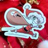 Sticker représentant un père Noël chibi en pleine distribution de cadeaux @Ysae illustrations