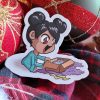 Sticker représentant une petite fille qui ouvre son cadeau de Noël @Ysae illustrations